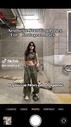 a woman standing in an alley with her hand on her hip and the caption reads, aesthetic standing poses for instagram pics if you're - non - photograph