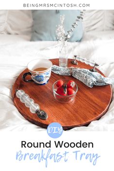 round wooden breakfast tray with strawberries on it