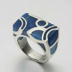 An Absolutely Gorgeous Ring. This Will Surely Turn Heads Heads With It's Beauty. An Elegant Blue With A Unique Look. Stainless Steel So There's No Discoloration On Your Finger. Blue Modernist Jewelry With Polished Finish, Modernist Blue Jewelry With Polished Finish, Modern Blue Jewelry For Anniversary, Unique Blue Nickel-free Rings, Nickel Free Blue Metal Rings, Nickel-free Blue Metal Rings, Blue Nickel-free Stainless Steel Jewelry, Blue Metal Jewelry For Anniversary, Modern Blue Ring As Gift