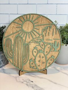 a wooden plate sitting on top of a table next to plants and potted plants