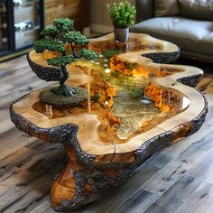 a table made out of wood with a bonsai tree in the center on top