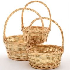 three wicker baskets sitting next to each other