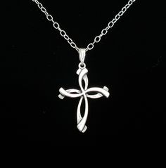 "Cross for Believers" Sterling Silver Cross Pendant. Antique 925 Sterling Silver "Ribbon" Cross on 925 Sterling Silver Bail (hanger). Measures 1 3/8 x 3/4". 925 Sterling Silver 20" Oval Cable Chain & 925 Sterling Silver Lobster Claw Clasp included. We can substitute a Toggle Clasp, Barrel, Hook & Eye Clasp upon request at no cost. See same Pendant with different Bail & Chain on our Men's Board. Beautiful way to share your Faith!!! Ribbon Cross, Crafty Jewelry, Swarovski Pendant, Cross Gift, Sterling Silver Cross Necklace, Sterling Silver Locket, Silver Ribbon, Silver Locket, Sterling Silver Cross Pendant