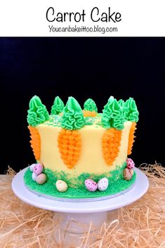 a carrot cake with green frosting on a plate