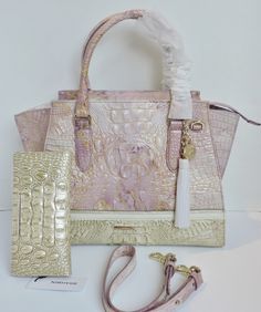 Brahmin Priscilla Lilac Whimsy Embossed Leather Satchel Ady Stardust Wallet. Lilac And Stardust Croc Embossed Leather, Gold Accents, Adjustable, Detachable Leather Shoulder Strap. Rolled Double Croc Leather Straps With A Slip Phone Pocket On Back Of Bag. Gold Tone Hardware (Still Has Plastic Cover on Bag & Wallet) With Zipper Closure, Four Gold Tone Feet On Bottom Of Bag. Interior Brahmin Signature Lining With Zipper Pocket On Back Wall Of Bag And Two Utility Pockets Trimmed In Leather With Smal Pastel Handbags, Brahmin Purses, Frye Handbags, Leather Passport Wallet, Brahmin Bags, Statement Bag, Gold Bag, Croc Leather, Plastic Cover