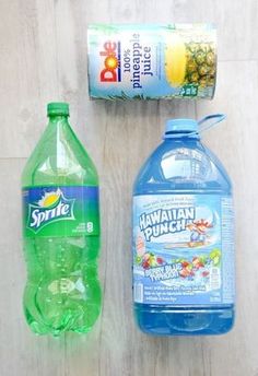 two bottles of water, one with hawaiian punch and the other with sprite on it