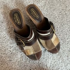 Coach Brown Mules Women’s Size 6.5 Never Worn, Small Chip In Corner, See Photos For Details Super Cute And Stylish! Retro Brown Closed Toe Mules, Brown Leather Clogs With 4-inch Heel, Retro Brown Slip-on Mules, Brown Retro Slip-on Mules, Retro Brown Mules With Round Toe, Coach Slip-on Mules, Brown Mules With 4-inch Heel And Round Toe, Casual Coach Slip-on Mules, Brown High Heel Clogs With 4-inch Heel