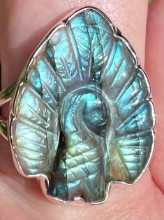 Only $29.99! This Labradorite Peacock Ring Size 9 is so incredibly beautiful and has amazing color! Labradorite is a stone of transformation. It can be useful for those who are going through change by helping them tap into their inner strength. This stone balances and protects the aura. It is an excellent stone for strengthening the wearer’s intuition. Labradorite removes fears and insecurities enabling you to pursue your dreams with self-assurance and trust in the Universe’s plan for your fu Trust In The Universe, Peacock Ring, Peacock Jewelry, Pursue Your Dreams, Labradorite Jewelry, Crystal Shop, Inner Strength, Crystal Jewelry, The Universe