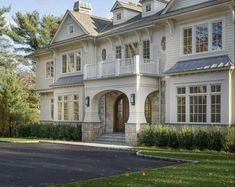 a large white house with lots of windows