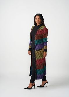 Style#: 7003/P7003 We love versatility and the Aisha African Print Cardigan in Rainbow Diamond Stripes delivers just that. Wear this gorgeous duster-length cardigan sweater open as a layering accent to your outfit of fully buttoned as a statement dress. Features: Contrast color rib knit border and sleeve cuff Can be styled open or closed Regular Length Range: 51-53" Plus Length Range:53 1/2"-54 1/2" Designed in the USA, imported Care Instructions: Hand wash cold. Do not soak. Do not bleach. Lay Knit Border, African Print Kimono, Rainbow Diamond, Print Outerwear, Outwear Women, African Print Dress, Statement Dress, Sleeve Cuff, Printed Cardigan