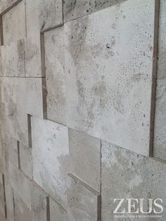 a wall made out of cement blocks with holes in the middle