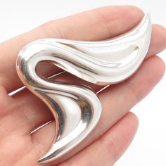 Great vintage condition.  925 Sterling Silver Vintage Wavy Modernist Pin Brooch  Weight: 21.1g   WELCOME TO PAWN SHOP We are an actual pawn shop and have been in business for over 25 years. Since 1990, our establishment has been serving a variety of clients by providing them with short term cash solutions and options of liquidity regarding their treasured heirlooms. Acknowledging that today′s customers are very sophisticated and are looking for a variety of investments, our acquisitions are hand Pawn Shop, Pin Brooch, Hand Picked, 25 Years, Beautiful Earrings, Brooch Pin, Band Rings, Patina, Silver Bracelet