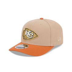 the kansas chiefs'new era hat is shown in tan and orange