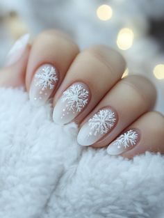 Celebrate in style with our array of 27 simple Christmas nail ideas. These charming designs offer a festive touch without overwhelming your look. From minimalist reindeer motifs to subtle glitter gradients, these easy-to-achieve nails will keep your fingertips looking merry all season long. White Snowflake Christmas Nails, Basic Nails Christmas, Festive Nail Art Designs, White Simple Christmas Nails, Minimalist Xmas Nails, Subtle Christmas Nail Designs, Subtle Christmas Nails Gel, Acrylic Nail Designs Christmas Simple, Simple Christmas Nails Snowflake