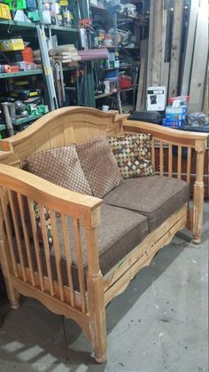 a wooden bench with cushions in a store