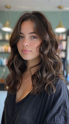 25 Dark Brown Hair Shades for Every Mood Brown Hair For Brown Eyes, Brown Hair With Hazel Eyes, Natural Brown Curly Hair, Chocolate Brown Hair With Dimension, Brown Hair For Pale Skin, Hazel Eyes And Brown Hair, Solid Brown Hair, Natural Brown Hair Color, Brown Hair Woman