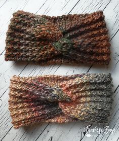 two knitted headbands sitting next to each other