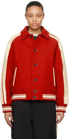 Padded wool- and nylon-blend broken twill bomber jacket. Grained sheepskin trim throughout. · Spread collar · Button closure · Welt pockets · Striped rib knit hem and cuffs · Logo plaque at back collar · Welt pocket at interior · Full satin lining Supplier color: Red Ader Error, Red Button, Red Jacket, Welt Pockets, Welt Pocket, Outerwear Jackets, Apparel Accessories, Rib Knit, Bomber Jacket