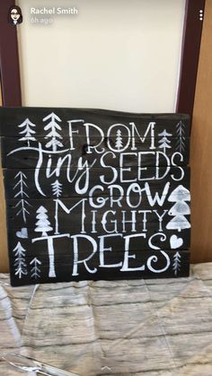 a wooden sign that says from my seeds to grow mighty trees