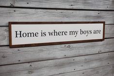 a sign that says home is where my boys are