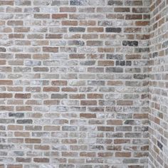 an old brick wall is shown in this image