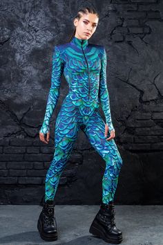 If you're lookin' for your next festival fit, you've come to the right place. The Mystic Peacock Costume is an absolute showstopper. This piece is made from a high quality stretchy and breathable Lycra fabric, printed with exceptional graphics as alwayz. The design features a body con fit, padded shoulders, long sleeve Halloween Costume Women, Zentai Suit, Strapless Tube Dress, Suspenders For Women, Costume Women, Jumpsuit Summer, Maxi Dress Formal