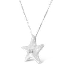 Beguile her with starbursts of light-reflecting beauty of this gorgeous diamond star fish pendant crafted in sterling silver. The center of the star fish is adorn with a cluster of 7 prong set shimmering single cut diamonds. This dainty pendant hangs from a cable chain. Total diamond weight is 1/30 ctw. Fish Pendant, Starfish Pendant, Star Fish, Dainty Pendant, Bridal Bands, Diamond Star, Bracelet Collection, Fine Earrings, Earrings Collection