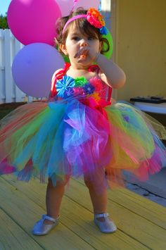 Fun Multicolor Tutu Dress For Dress-up, Playful Tulle Tutu Dress For Birthday, Princess Style Multicolor Tutu Dress For Playtime, Cute Multicolor First Birthday Dress, Cute Multicolor Dress For First Birthday, Playful Multicolor Dress For First Birthday, Cute Rainbow Birthday Dress, Whimsical Rainbow Birthday Dress, Multicolor Playful Tutu Party Dress