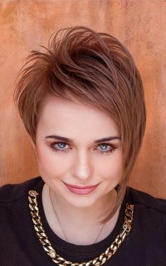 Short shaggy asymmetrical bob with layered texture, creating an edgy, modern style