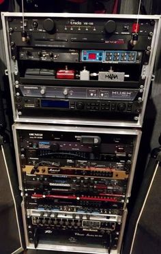 an array of audio equipment is stacked on top of each other