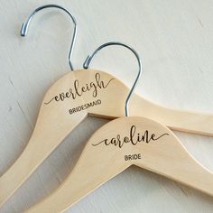 two wooden hangers with names on them that read, engelgin bride and carcinoe bride