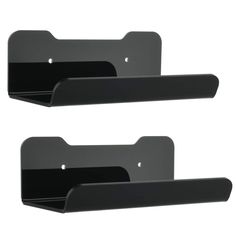 two black metal shelfs with brackets on them