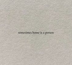 the words sometimes home is a person written in black ink on a white paper background