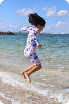 Get ready for some summer fun in the Aloha Burn Blocker Suit! The Aloha is designed to keep your little ones comfortable and protected from the sun. Pattern includes short and long sleeves and features a zip-up front for easy on/off. A full zipper shield keeps the suit comfortable on the inside, prevents chafing at the neckline and keeps the zipper pull out of reach for the little ones. Sizes 3 mos. - 4t include an optional snap inseam. Pattern comes with a full tutorial and color photos in an e Swim Romper, Bathing Suit Patterns, Sun Pattern, Suit Pattern, Photo Tutorial, Swim Suit, Rash Guard, Bathing Suit, Summer Fun