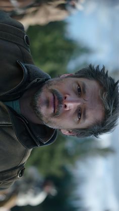 a man standing in front of a mirror with his face close up to the camera