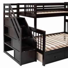 a bunk bed with drawers underneath it and a pull out desk underneath the bottom shelf