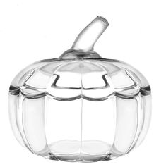 a clear glass pumpkin shaped object on a white background