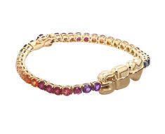 This beauty is not only customizable, it has the most stunning shades of precious stones, and it looks so glamorous stacked with other bracelets. Available in 14k yellow, rose, or white gold 4mm multi-colored stones include sapphires, amethyst, tourmaline, peridot, ruby, rubillite, and tourmaline Letters measure 11mm in height Avoid contact with water, perfumes and lotions Please note the letters feature a unique finish of high polish gold on the top half and matte gold on the bottom half By Typ Luxury Multicolor Tennis Bracelet As Gift, Elegant Rainbow Round Bracelets, Elegant Multicolor Tennis Bracelet As A Gift, Elegant Rainbow Multi-stone Bracelets, Elegant Multicolor Stackable Jewelry, Elegant Rainbow Bracelets For Parties, Elegant Multicolor Stackable Bracelets, Half Tennis Bracelet, Puffy Letters