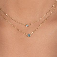 This dainty aquamarine station necklace is perfect for everyday wear. Bezel set in solid 14k gold, available in 2 sizes, and adjustable at 2 lengths... the ultimate March birthstone necklace. Stone: Aquamarine Dimensions: 3MM or 4MM 14k Solid Yellow Gold