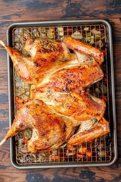 roasted chicken on a baking rack ready to be cooked in the oven for roasting