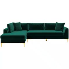 a green sectional couch with gold legs and pillows on it's back, against a white background