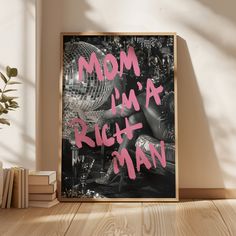 a black and pink poster with the words mom i'm a rich man on it