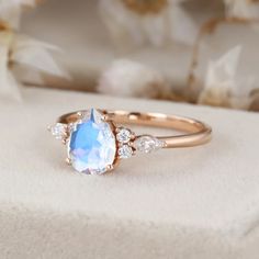 Indulge in timeless beauty with our vintage 14k rose gold women's june birthstone ring featuring a 1.5 carat pear cut moonstone. This ring is a radiant expression of the timeless beauty of both vintage design and the june birthstone. Unique Gemstone Engagement Rings, Rose Gold Promise Ring, June Birthstone Ring, Pear Ring, Moonstone Engagement, Promise Ring Gift, Moonstone Engagement Ring, June Birthstone, Matching Rings