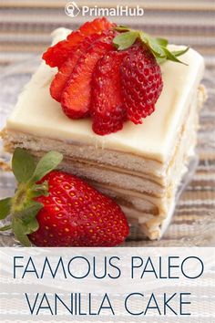 a piece of cake with strawberries on top and the words famous paleo vanilla cake