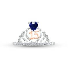 Make her feel majestic on her special day with this sparkly crown ring crafted in sterling silver. A heart-shaped blue lab-created sapphire – the birthstone of September – shines atop the design. The number 15 gleams in 10K rose gold inside the heart-shaped center, while a line of white lab-created sapphires shimmer on the band to finish the look. Blue Quince, White Lab, Crown Ring, Ring Crafts, Quince, Heart Shapes, Sterling Silver Rings, Sapphire, Crown