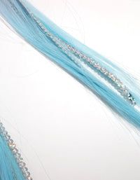 blue and white hair with silver beads on the ends is laying in front of a white background