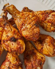 grilled chicken wings on a white plate