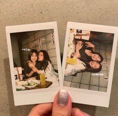 two polaroids are held up in front of the camera, one is holding a drink