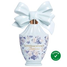 Fragrance Family: FloralsScent Type: Classic FloralsKey Notes: Blackcurrant, Peony, White AmberFragrance Description: This classic and clean, skin-loving floral is a charming and innately cool bouquet with an abundance of peonies and a blush of blackcurrant. The notes of spherical blooms are joined by touches of white flowers including tuberose, rose, and jasmine, while soft white amber and sandalwood offer a smooth and soft finish. Perfumes White Background, Love Shack Fancy Perfume, Loveshackfancy Perfume, Coquette Products, Perfume Ariana Grande, Perfume Blue, Fancy Perfume, Girly Products, Egyptian Perfume