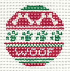 a cross stitch ornament with the words happy new year written in red and green